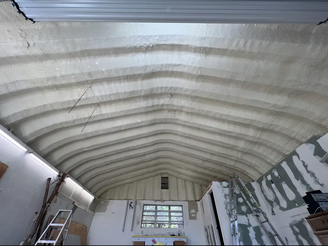 Spray polyurethane foam applied to the underside of a metal roof deck in South Londonderry